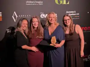 Owner Clare John and daughters accepting Self Catering Accommodation of the year Award at Worcestershire Tourism Awards