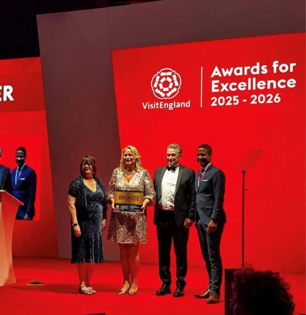 Clare from Rowley Farm Holidays collecting her Award at VIsitEngland National Awards